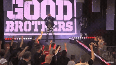 Group Standing Before Good Brothers Sign GIF