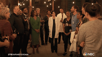 Group Standing In Circle #NewAmsterdam GIF