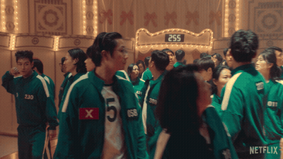 Group Standing In Front Of 255 Sign GIF