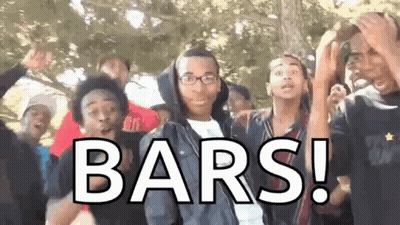 Group Standing In Front Of Bars Sign GIF