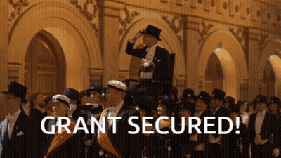 Group Standing In Front Of Building Grant Secured GIF