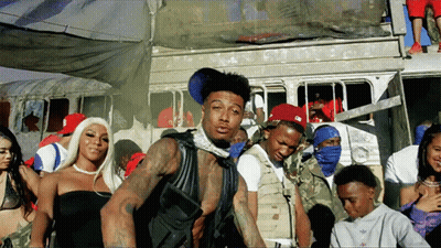 Group Standing In Front Of Bus With Adidas Hat GIF