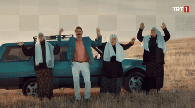 Group Standing In Front Of Car Saying TRT 1 GIF