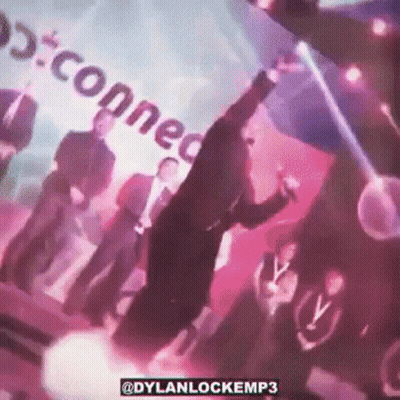 Group Standing In Front Of Connect Sign GIF