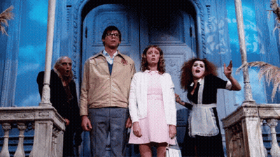 Group Standing In Front Of Door With Jacket Letter O GIF