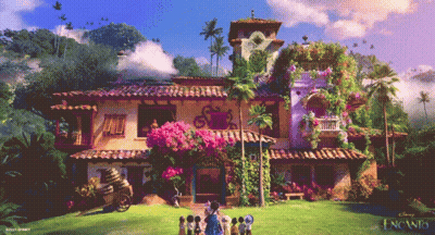 Group Standing In Front Of Encanto House GIF