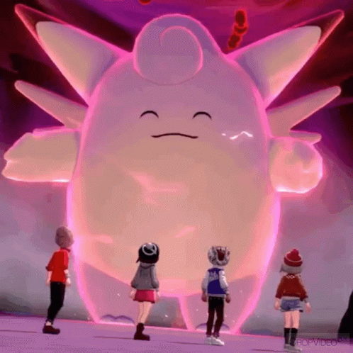 Group Standing In Front Of Giant Pink Monster Says Cropvideo GIF