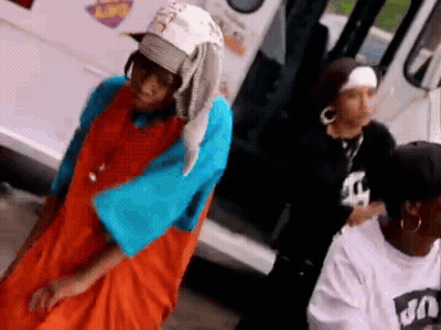 Group Standing In Front Of Ice Cream Truck GIF