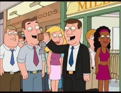 Group Standing In Front Of Miller Sport Goods Store GIF