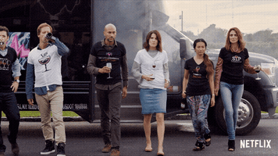 Group Standing In Front Of Netflix Truck GIF