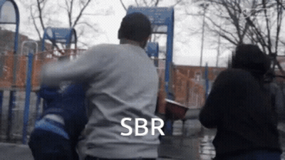 Group Standing In Front Of Playground Saying SBR GIF