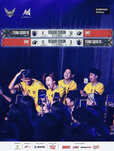 Group Standing In Front Of Team Liquid 10 Sign GIF