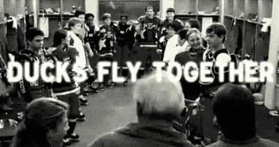 Group Standing in Locker Room Ducks Fly Together