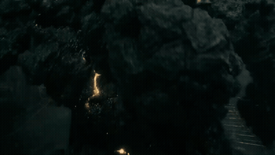 Group Standing In Rain With Light GIF