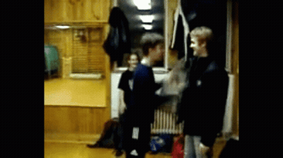 Group Standing In Room With Adidas Shirt GIF