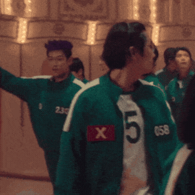 Group Standing In Room With Green Jersey Number 238 GIF