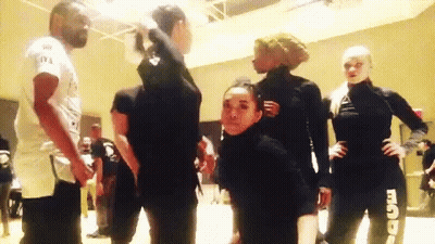 Group Standing Room With T.I. Shirt GIF