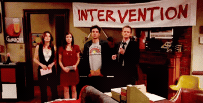 Group Standing Under Intervention Banner GIF