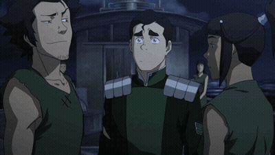 Group Standing With Cross On Chest GIF