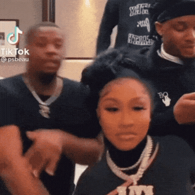 Group Standing Woman Holding Head GIF