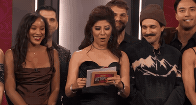 Group Surrounding Woman Holding Big Bro Sign GIF