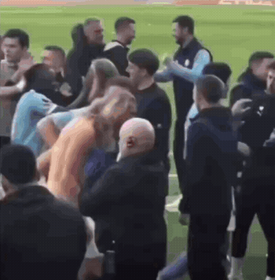 Group Talking On Soccer Field GIF