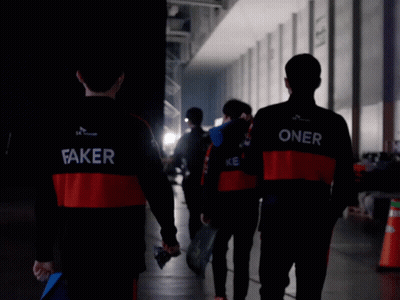 Group Walking Down Hallway Jacket Says Faker GIF