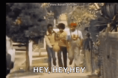 Group Walking Down Street Saying Hey Hey Hey GIF