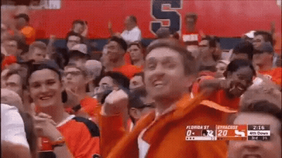 Group Watching Basketball One In Orange Jacket With S GIF