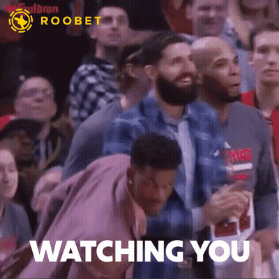Group Watching Basketball Saying Watching You