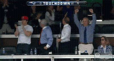 Group Watching Football Game Scoreboard Says Touchdown GIF