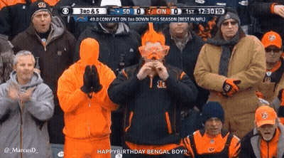 Group Watching Football With Orange Hair Man GIF