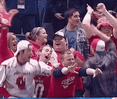 Group Watching Game Person In Red Jersey Number 10 GIF