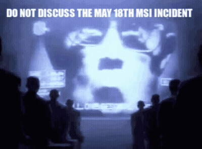 Group Watching Projection Of Man Saying Do Not Discuss The May 18Th MSI Incident GIF