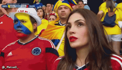 Group Watching Soccer With Colombian Flag Face Paint GIF