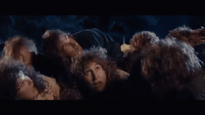 Group With Curly Hair Making Funny Faces GIF