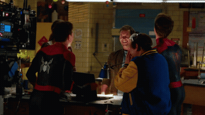 Group With One Wearing Spider-Man Sweatshirt GIF