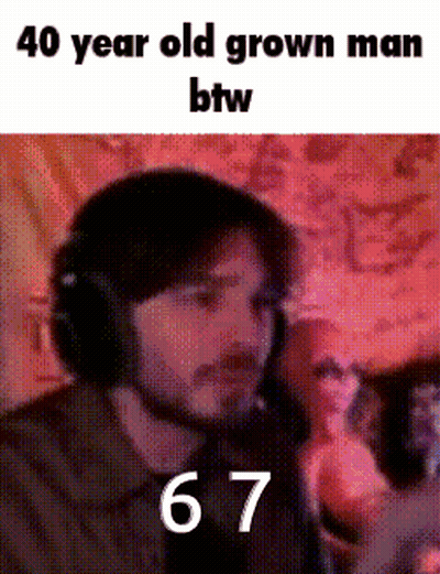 Grown Man In Headphones Sitting Before Group GIF
