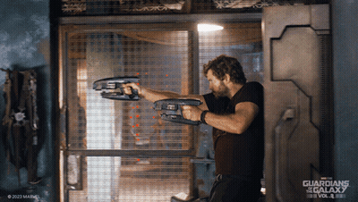 Guardians Of The Galaxy Poster Man Holding Gun GIF