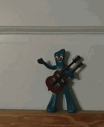 Gumby Cool Toy Holding Guitar GIF