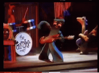 Gumby On Stage Playing Guitar GIF