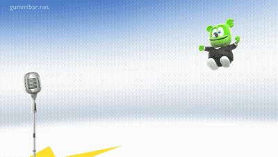 Gummy Bear In Tuxedo Jumping In Front Of Microphone GIF