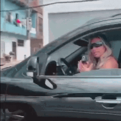 Gun Woman On The Van GIF