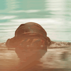 Gunner Biting His Gun In Water GIF