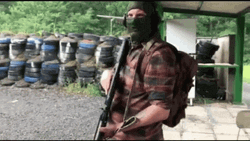 Gunner Readying His Gun GIF