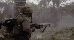 Gunner Shooting From Behind Of Coconut Tree GIF