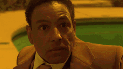Gustavo Fring Trying To Attack A Man GIF
