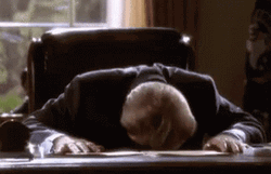 Guy Bang His Head On Desk GIF