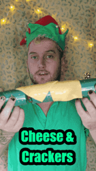 Guy Christmas Elf Cheese And Crackers GIF