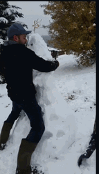 Guy Destroy The Snowman GIF